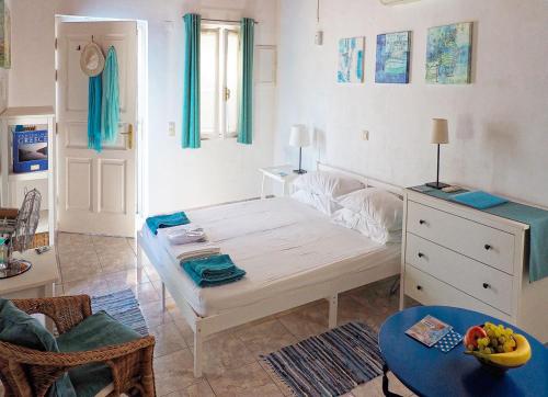 Posteľ alebo postele v izbe v ubytovaní Summer Garden Studio - village location