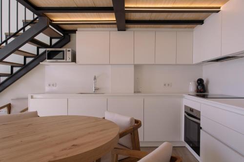 Η κουζίνα ή μικρή κουζίνα στο Joyma Boutique Apartments