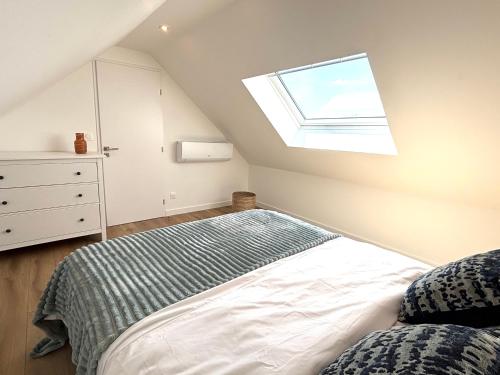 En eller flere senge i et værelse på M112 Marquer Superbe T4 spacieux avec balcon, proche de Genève