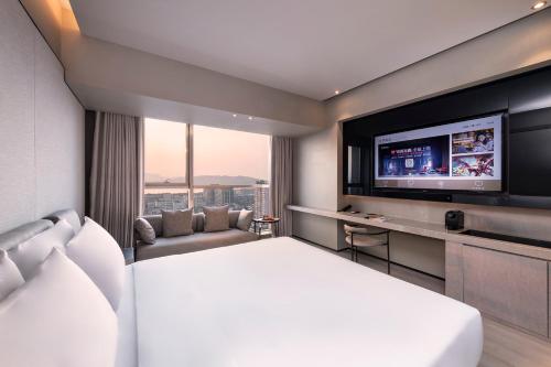 Postel nebo postele na pokoji v ubytování Crystal Orange Hotel -Hangzhou West Lake Hubin Yintai