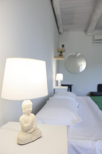 Postel nebo postele na pokoji v ubytování B&B Italia Rende