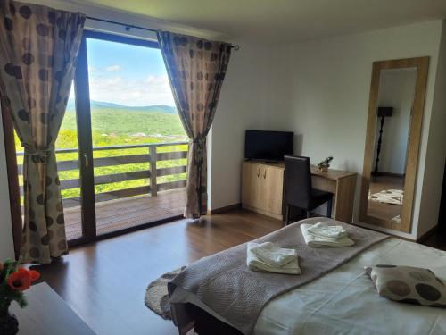 Postel nebo postele na pokoji v ubytování The White House Sohodol