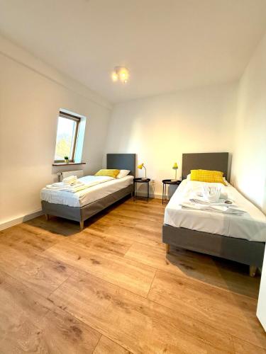 Ένα ή περισσότερα κρεβάτια σε δωμάτιο στο Apartment Goldstück