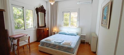 Ένα ή περισσότερα κρεβάτια σε δωμάτιο στο Dafni's Super Home