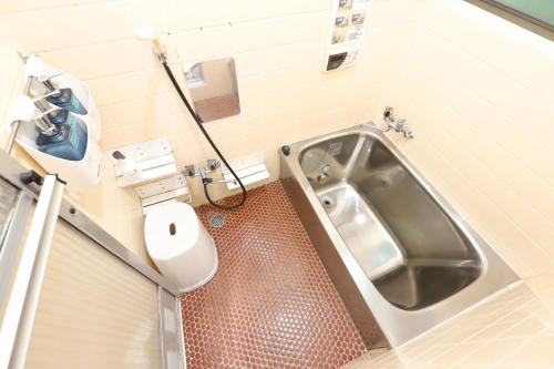 Un baño de HILDA INN