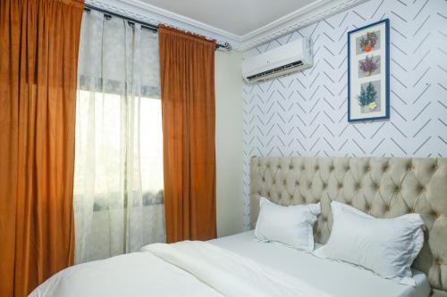 Postel nebo postele na pokoji v ubytování KK Lodging Yaounde Fouda