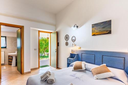 Katil atau katil-katil dalam bilik di Agriturismo Paulesa