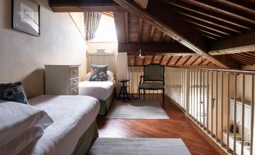 A bed or beds in a room at Poggio al Casone