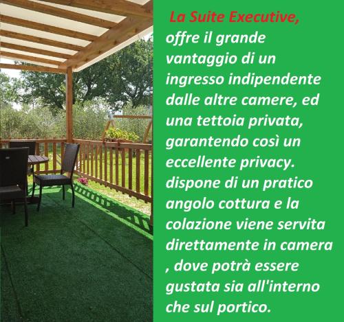 a picture of a patio with a pergola at LE CERQUE in Spoleto
