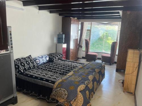 Llit o llits en una habitació de Allaya Appartment
