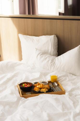 Katil atau katil-katil dalam bilik di Hôtel Opéra Liège