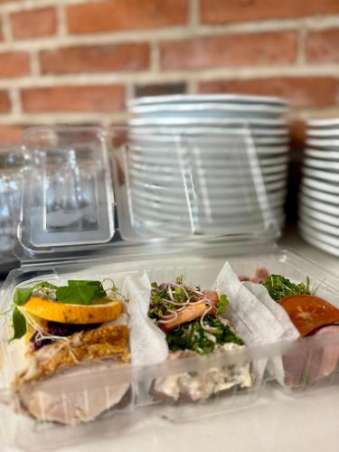 a plastic container filled with food on top of a counter at Hotel Korning in Horsens
