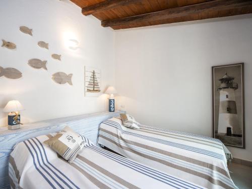 Ένα ή περισσότερα κρεβάτια σε δωμάτιο στο V 21 Campidano