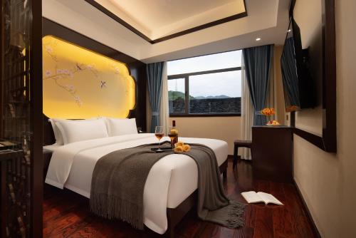 Ancient Dream Hotelにあるベッド