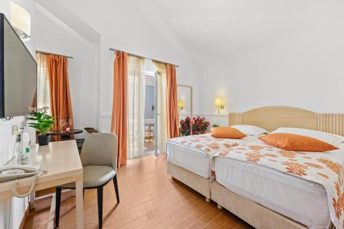Posteľ alebo postele v izbe v ubytovaní Amadria Park Apartments Šibenik
