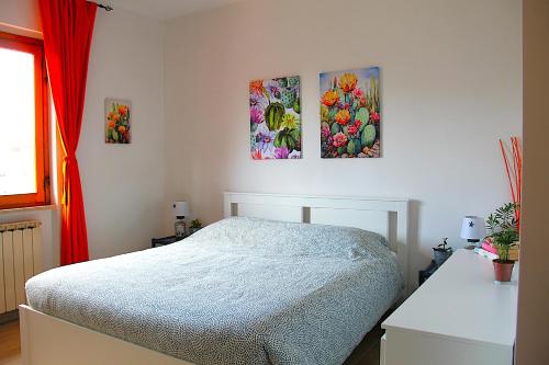 A bed or beds in a room at Casa ViDa Sabaudia