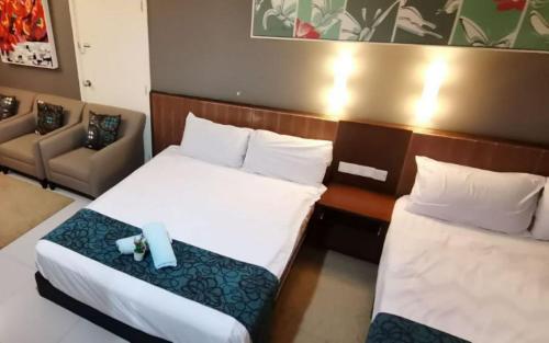 Postel nebo postele na pokoji v ubytování YUYU A12 Honeymoon GVR GENTING HIGHLAND