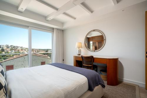 Una cama o camas en una habitación de Dalyan Residence & Suites