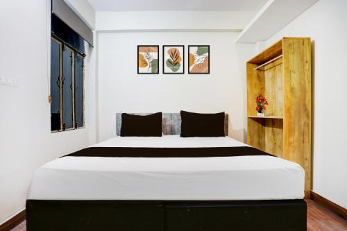 Ένα ή περισσότερα κρεβάτια σε δωμάτιο στο Hotel O George Town