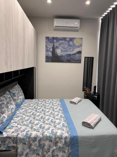 Postel nebo postele na pokoji v ubytování E' bello qui!
