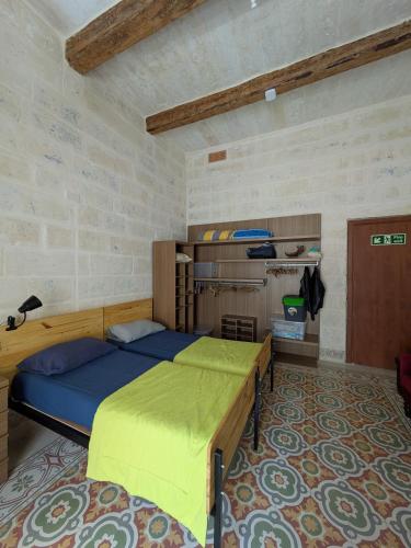 Postel nebo postele na pokoji v ubytování Paddy's Duplex