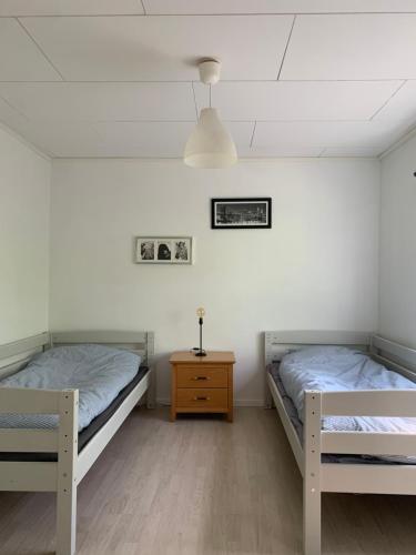 Postel nebo postele na pokoji v ubytování Aspö Estates