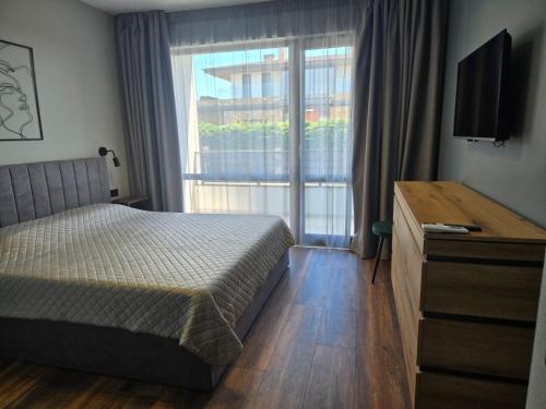 Postel nebo postele na pokoji v ubytování Villa Calypso