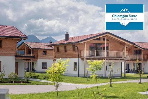 a picture of a house with the text chanson mortgage mortgage market at Luxalps- Chalets Inzell- Sauna- Skifahren- Wandern- Natur- Chiemgau Card in Inzell