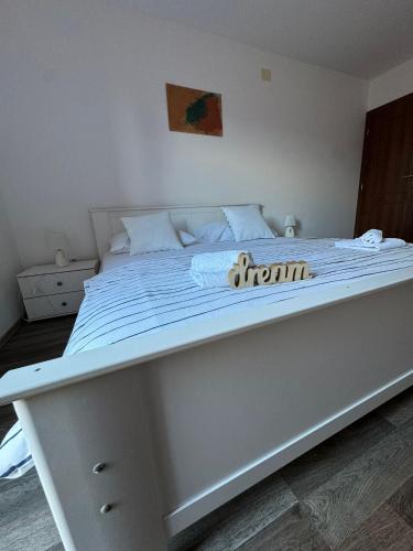 Postel nebo postele na pokoji v ubytování Apartmani "Bodulo"