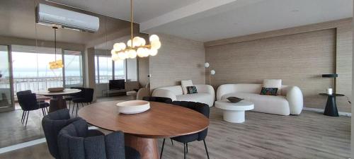 a living room with a couch and a table at GuestReady - Elegant Marina Apartment in Ponta Delgada
