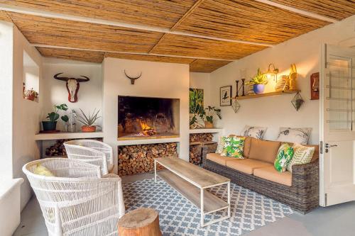 Posezení v ubytování Bloemendal Guest Cottage