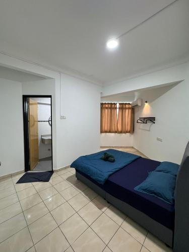 Katil atau katil-katil dalam bilik di Golden Straits Villas Beach Resort