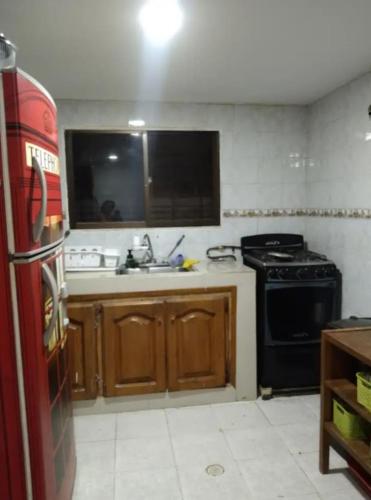 Nhà bếp/bếp nhỏ tại Habitacion privada con servicios incluidos