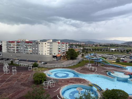 an aerial view of a water park with two pools at River Walk Sarajevo-Ilidza Best Apartman in Sarajevo