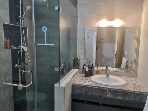 Koupelna v ubytování Appartement familial avec piscine Imi Ouaddar