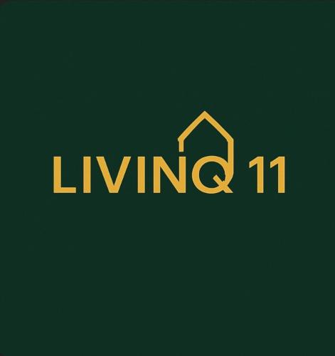 a sign that reads living with a house at LlVINQ 11 in Emstek