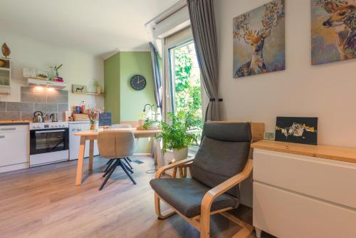 Kuchyň nebo kuchyňský kout v ubytování Cozy House - fietsverhuur, eigen keuken en badkamer