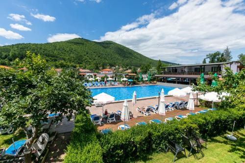 a view of a pool at a resort at Комплекс Варвара - Хотел, Аквапарк и Минерлни басейни in Varvara
