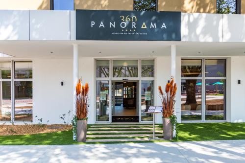a building with a sign that reads panoramic at HÔTEL PANORAMA 360 Bourg en Bresse - Cœur de ville in Bourg-en-Bresse