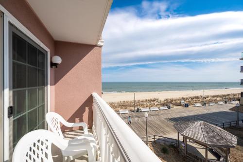 a balcony with a view of the beach at Boardwalk Plaza Hotel in Rehoboth Beach