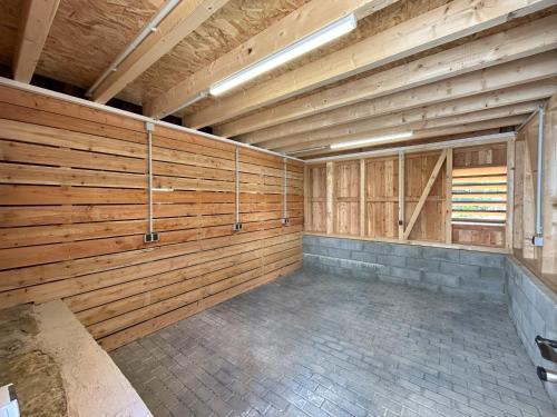 a large room with wooden walls in a building at Feriendomizil im Saarschleifenland in Mettlach