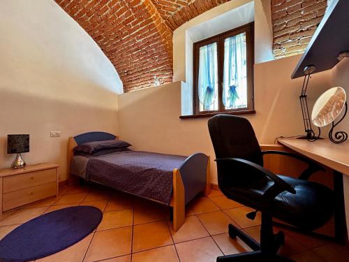 A bed or beds in a room at Appartamento G&G