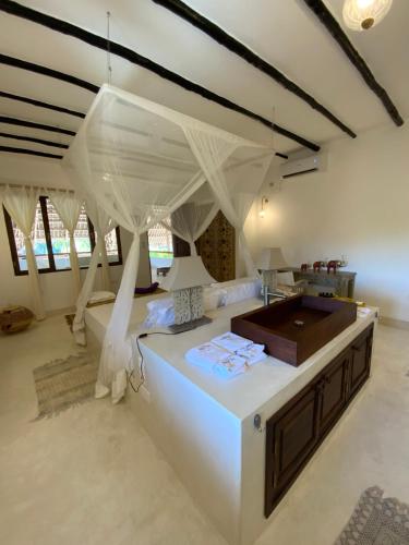 Ένα ή περισσότερα κρεβάτια σε δωμάτιο στο Alawi Home