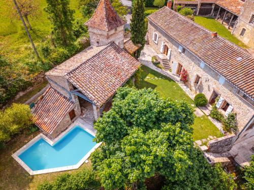 an aerial view of an old house with a swimming pool at Clos Saint Michel - Piscine - Nature & Calme in Saint-Michel-de-Vax