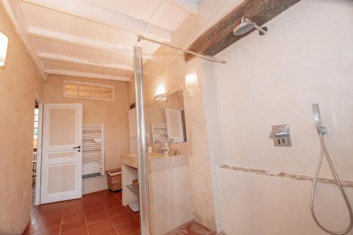 a bathroom with a shower and a sink at Clos Saint Michel - Piscine - Nature & Calme in Saint-Michel-de-Vax