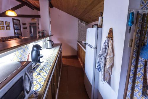 Η κουζίνα ή μικρή κουζίνα στο Casa das Duas Ribeiras
