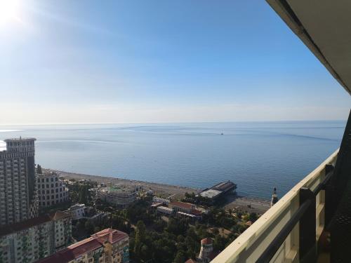 a view of the ocean from a building at Апартаменты Батуми первая линия in Batumi