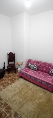 Ένα ή περισσότερα κρεβάτια σε δωμάτιο στο Vitorio's Guesthouse