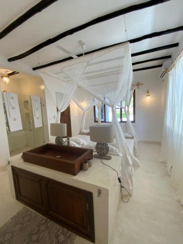 Ένα ή περισσότερα κρεβάτια σε δωμάτιο στο Alawi Home