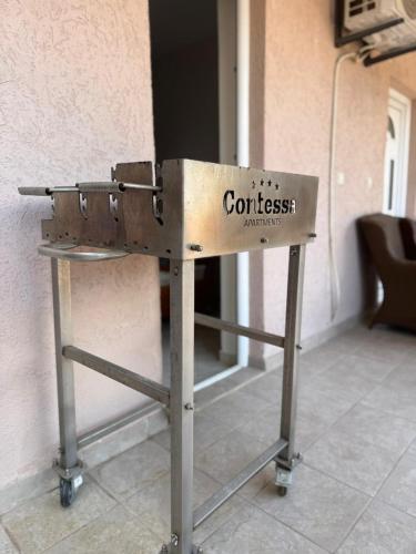 a metal object with the word correctness written on it at Contessa Apartments in Budva